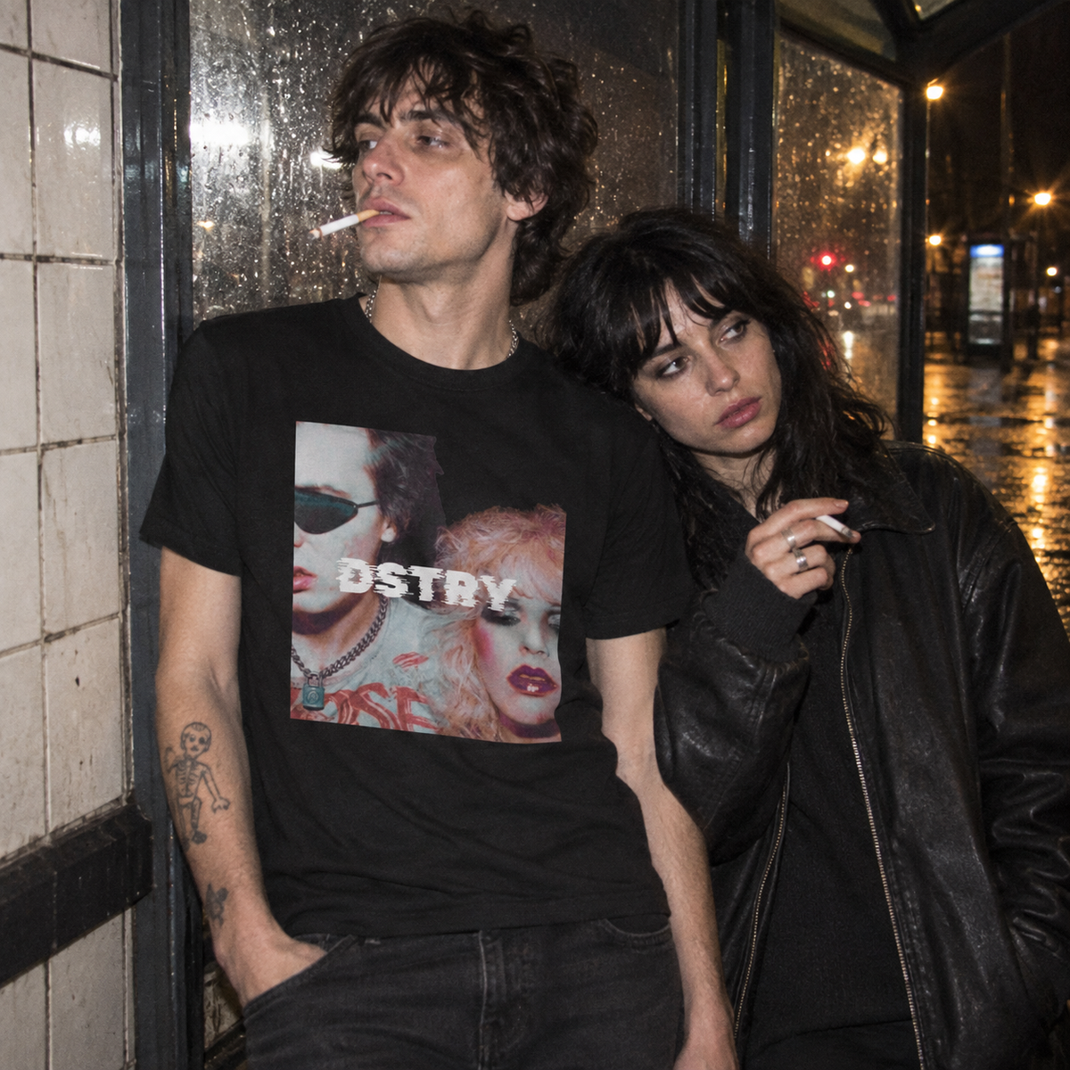 Lovers Tee lifestyle photo — night-bus shelter after the gig